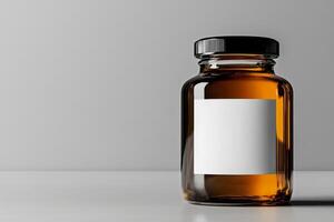 Brown Glass Jar With Blank Label on a Simple Gray Background in a Minimalistic Setting photo