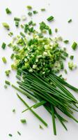 Freshly Chopped Green Onions and Spring Onions Arranged Neatly on a White Background. photo
