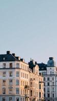 Beautiful Historic Buildings With Architectural Details Against a Clear Sky at Sunset in a City photo