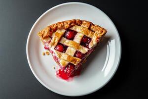Delicious Strawberry Pie With Lattice Crust Served on White Plate With Fresh Strawberries. photo