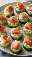 Delicious Cucumber Bites With Smoked Salmon and Dill for a Fresh Appetizer. photo