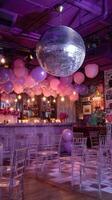 Elegant Party Setup With Purple Balloons and a Disco Ball in a Lively Venue photo