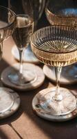 Elegant Sparkling Drinks Set on a Marble Tabletop in a Warm, Sunny Atmosphere During a Gathering. photo