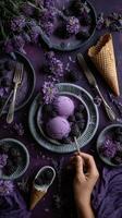 Delicious Purple Ice Cream Served With Blackberries and Flowers on a Stylish Table Setting photo