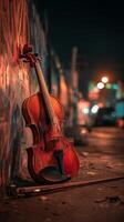 Beautifully Crafted Violin Resting Against a Graffiti Wall in a Dimly Lit Urban Alley at Night photo