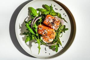 Salmon Fillet With Arugula and Black Sesame Seeds on a Minimalist Plate photo
