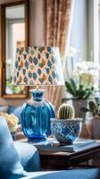 Bright Living Room Decor Featuring a Blue Vase Lamp and Unique Cactus Arrangement in Natural Light photo