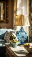 Bright Living Room Decor Featuring a Blue Vase Lamp and Unique Cactus Arrangement in Natural Light. photo
