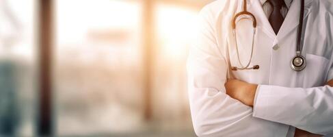 A doctor in a white coat with his arms crossed photo