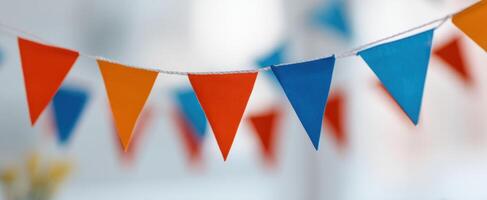 The colorful bunting decorations creating a vibrant festive atmosphere indoors. photo
