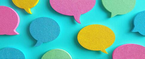 The colorful speech bubbles create a playful and vibrant communication theme. photo