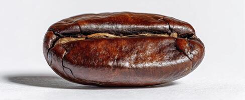 The detailed close-up of a perfectly roasted coffee bean photo