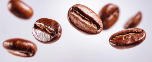 The floating coffee beans showcasing freshness and rich flavor profile. photo