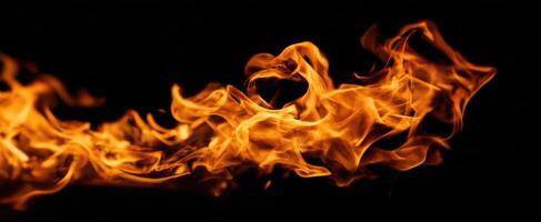 The Flames Dancing Elegantly Against the Black Background photo