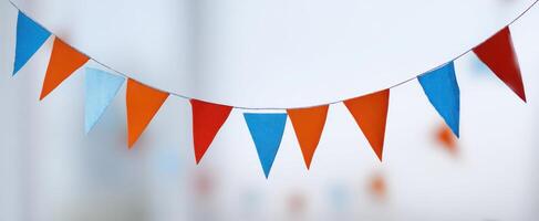 The colorful bunting flags creating a festive atmosphere for celebrations. photo