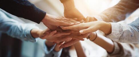 The hands of collaboration and unity in a diverse team environment. photo