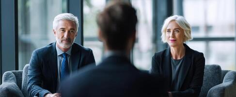 The professional discussion between two executives in a modern business environment. photo