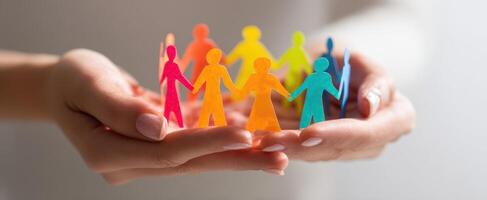 The vibrant circle of paper people symbolizing unity and togetherness photo