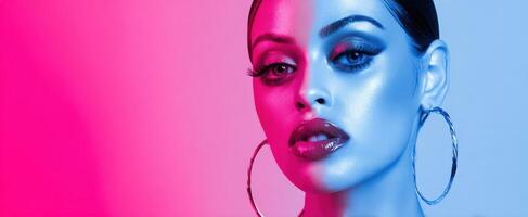 The striking portrait of a glamorous model in vibrant lighting. photo