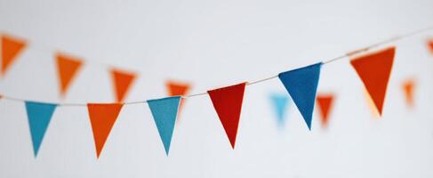 The colorful bunting string adds a festive touch to any celebration. photo