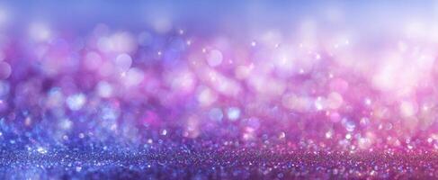 The sparkling glitter background in vibrant purple and blue tones. photo