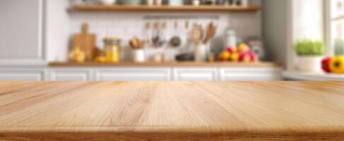 The wooden countertop in a modern kitchen filled with sunlight and fruits. photo