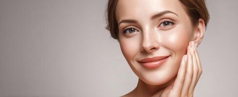 The radiant woman showcasing joyful beauty and flawless skin with gentle expression. photo