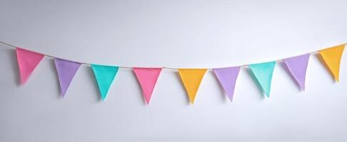 The colorful bunting flags create a vibrant atmosphere for any celebration. photo