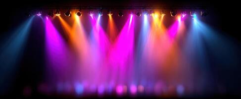 The vibrant stage lights illuminating a dynamic performance scene. photo