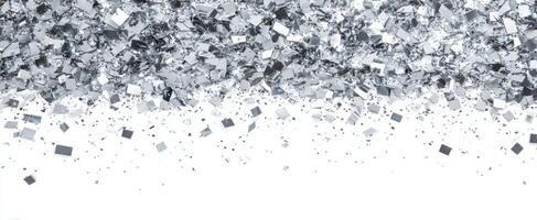 The shimmering silver confetti creating a festive background for celebrations. photo