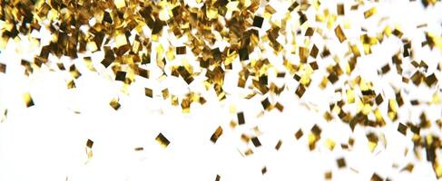 The shimmering gold confetti falling against a bright white background. photo
