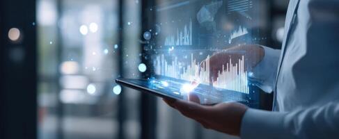 The tablet showcasing interactive data analytics and business growth trends. photo