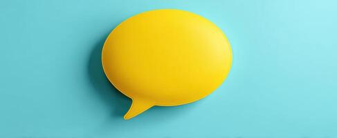 The vibrant yellow speech bubble against a calming blue background. photo