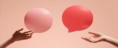 The hands exchanging colorful speech bubbles in a creative communication concept. photo