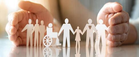 The Paper Figures Representing Family Care and Support in a Community Setting photo