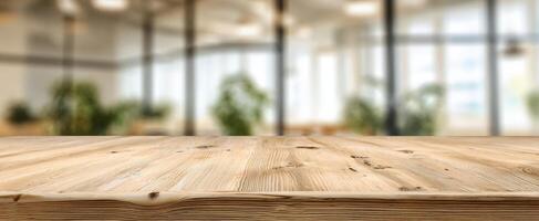 The wooden table showcasing a modern office environment with greenery in the background. photo
