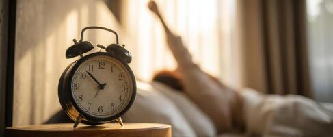 The alarm clock marking the start of a new day in a cozy bedroom. photo