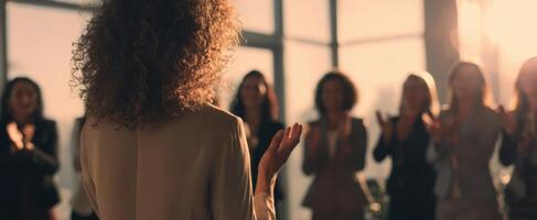 The speaker captivates the audience during a powerful business presentation. photo