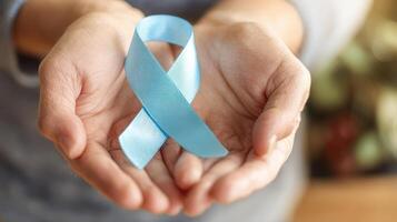 The blue ribbon symbolizing awareness and support for various health causes. photo