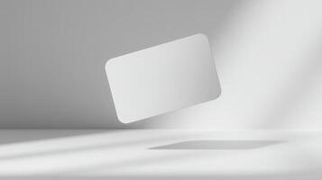 The floating blank card on a minimalist background with soft shadows. photo