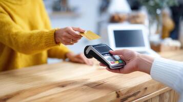 The payment process at a modern retail checkout with a credit card. photo
