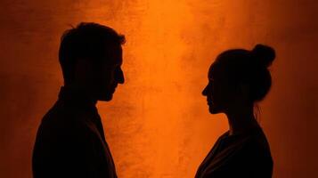 The Silhouette of a Couple in a Warm and Intimate Setting photo