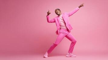 The man in the pink suit joyfully dancing against a vibrant background. photo
