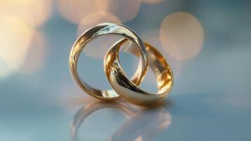 The elegant golden rings symbolizing love and commitment in a romantic setting. photo