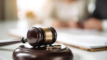 The gavel symbolizes justice in a marriage and divorce legal setting. photo