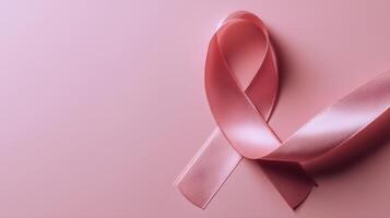 The elegant pink ribbon symbolizing awareness and support for cancer initiatives. photo