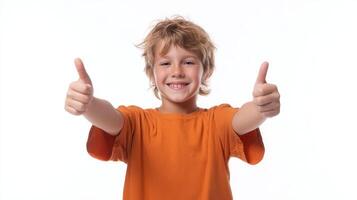 The cheerful boy giving thumbs-up with a big smile in a studio setting. photo