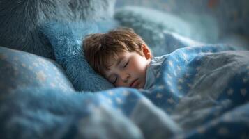 The Sleeping Boy in a Cozy Blue Bedroom Surrounded by Soft Pillows. photo