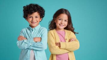 The confident siblings posing together with smiling faces against a bright background. photo