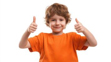 The cheerful boy giving a thumbs-up with a bright smile in an orange shirt. photo